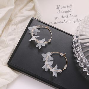 Golden needle transparent petal earrings