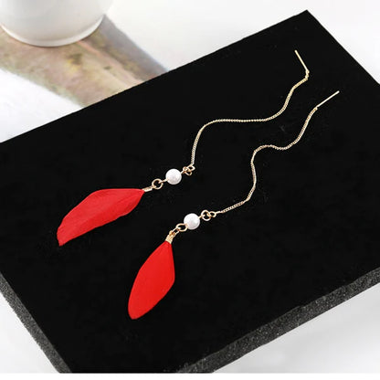 Asymetric feather long earrings