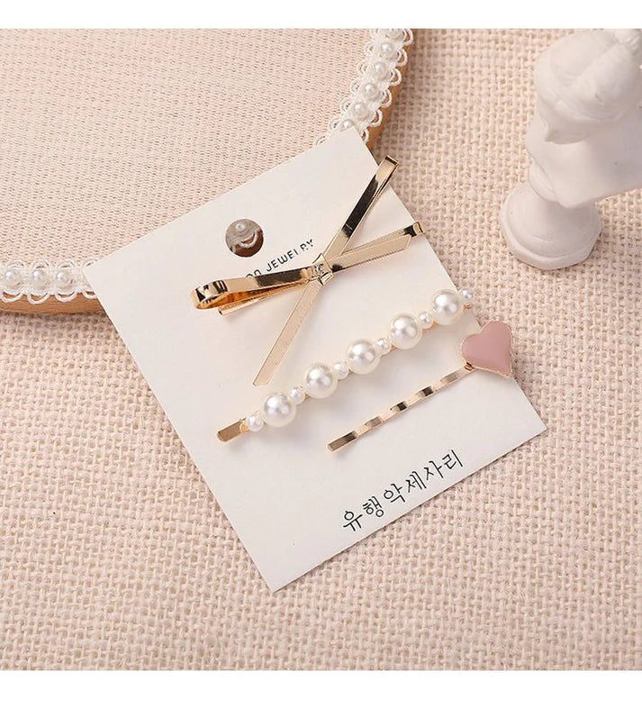 Experience Romantic Elegance with our 3Pcs Heart & Pearl Hairpin Set
