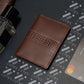 Minimalist Leather Wallet with Integrated Money Clip and Card Slots.