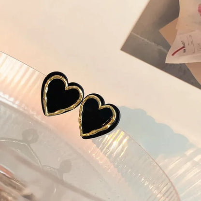 Lavish Jet-Black Heart Studs