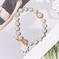 Embrace Nature's Beauty with our Fashion Flower Charm Beaded Bracelet