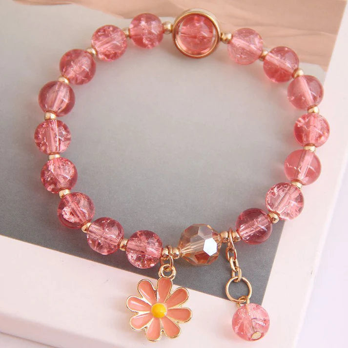 Adorn Your Wrist with the Elegance of our Flower Charm Beaded Bracelet