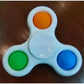 Fun and Stress Relief with the Pop It Fidget Spinner – The Ultimate Toy for All Ages