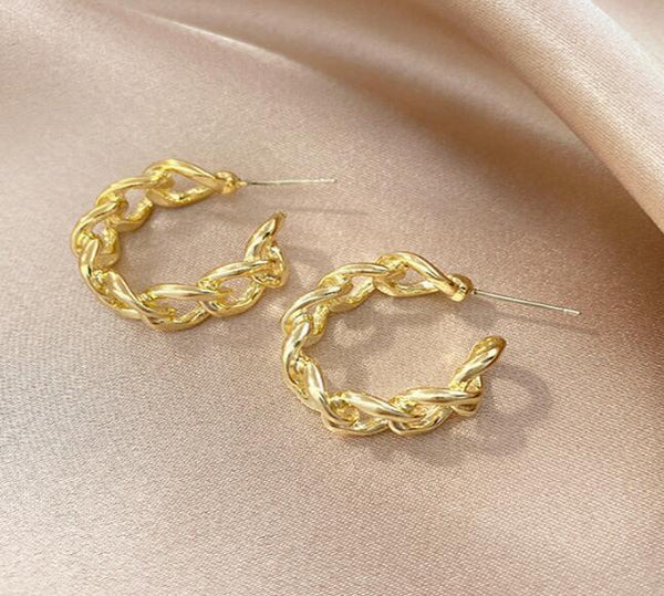 Golden Earrings with a Rope-Inspired Design